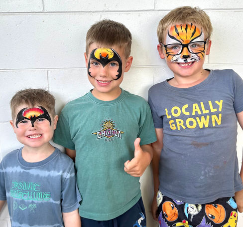 2 Batman Facepaints and a tiger facepainting by Luke and Kim Gladstone Queensland