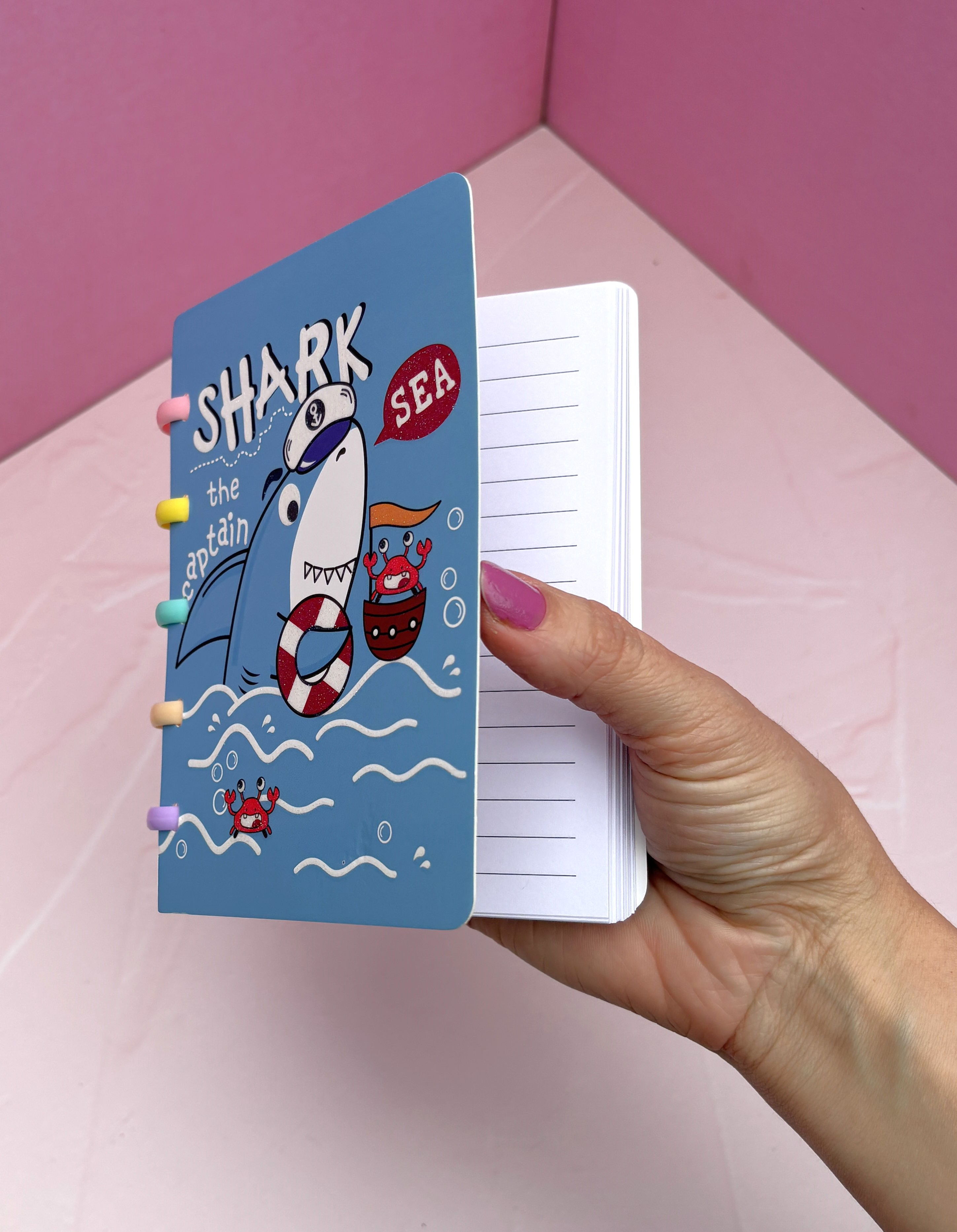 Libreta tiburón con discos