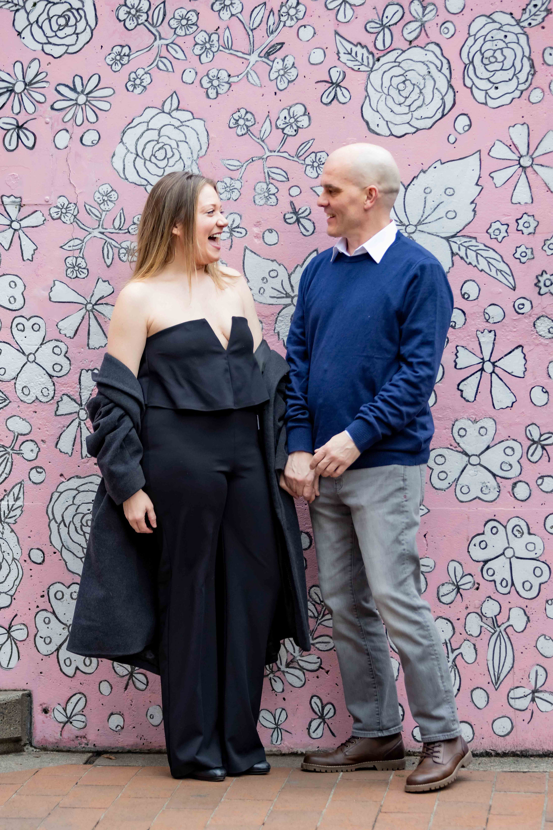 Engagement photo celebrating the love between Matt and Nora in downtown Seattle. Photo by James Murphy for Trainman Photography.
