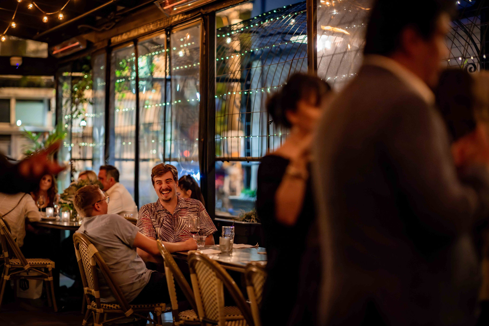 Anniversary photos of Studio RA celebrating at Bar Sabine in Ballard captured by Seattle event photographer James Murphy for Trainman Photography