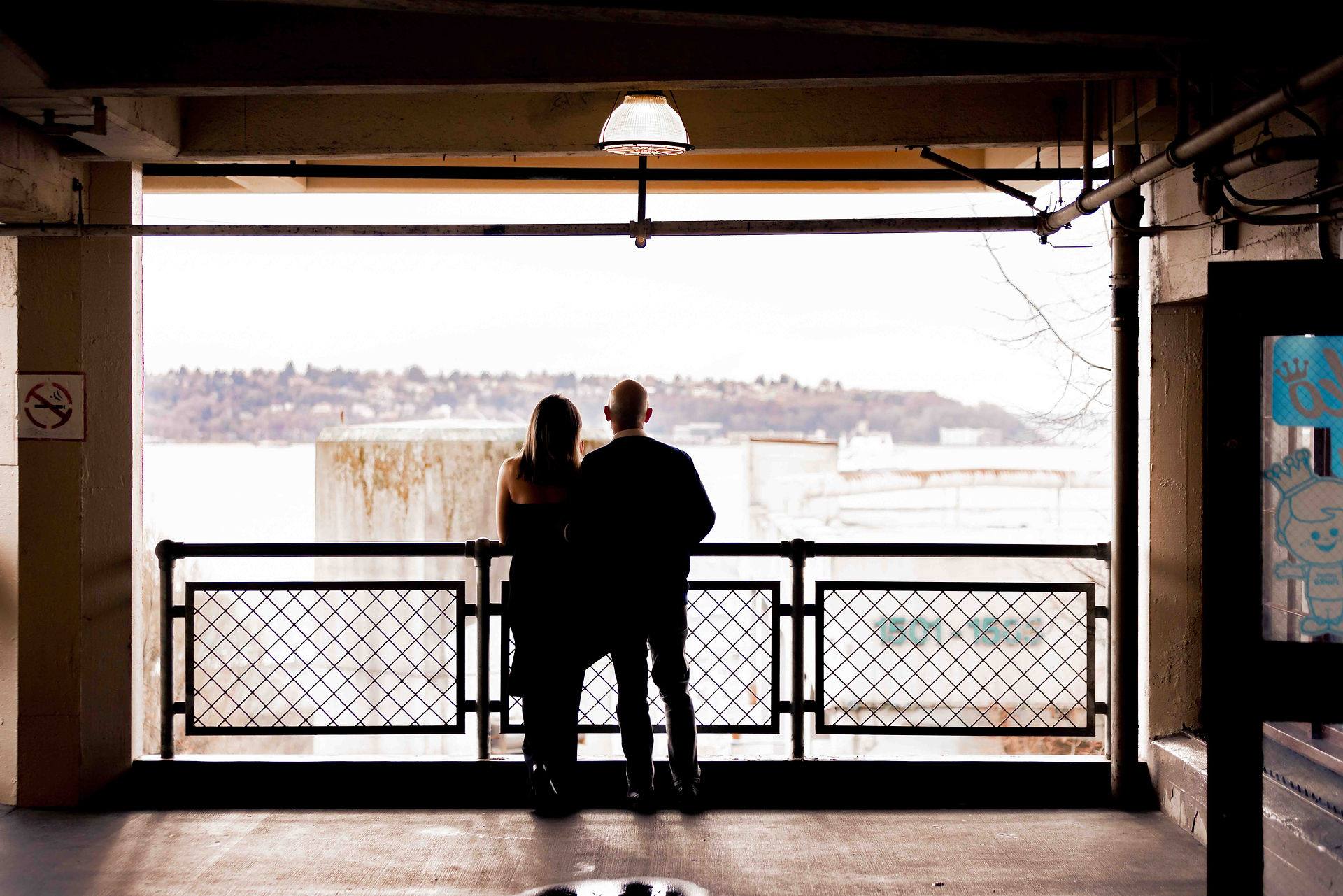 Engagement photo celebrating the love between Matt and Nora in downtown Seattle. Photo by James Murphy for Trainman Photography.