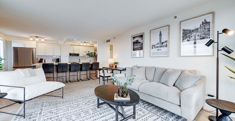 Large rug in the living room. This condo is a short-term furnished rental, which is also known as an airbnb. This condo is professionally managed by Squire Hospitality Inc., which is a division of Squire Property Management Inc. in Saskatoon, Saskatchewan.