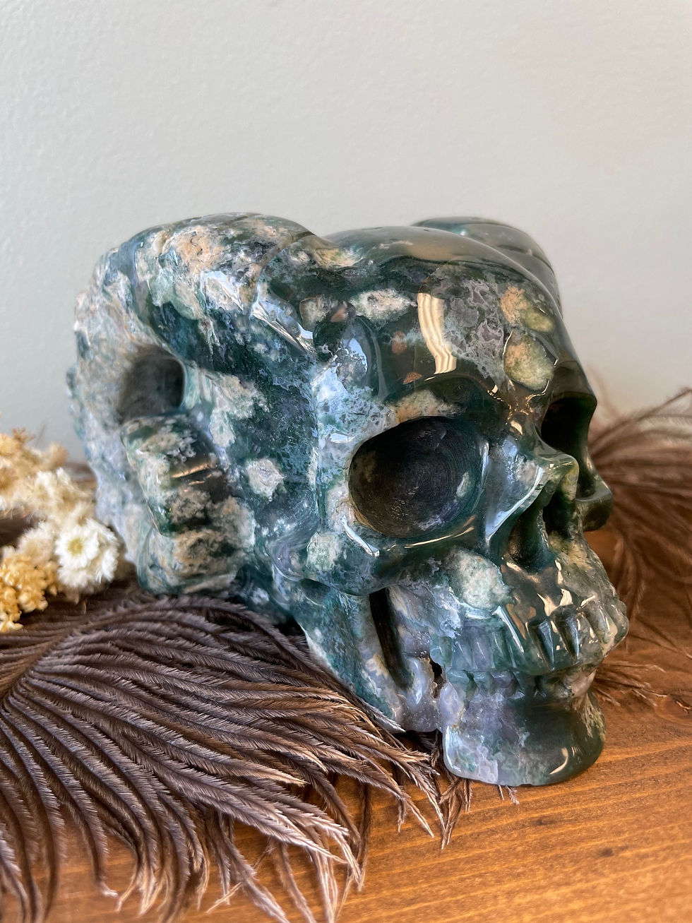 Thumbnail: Unique Ram Horned Moss Agate Crystal Skull