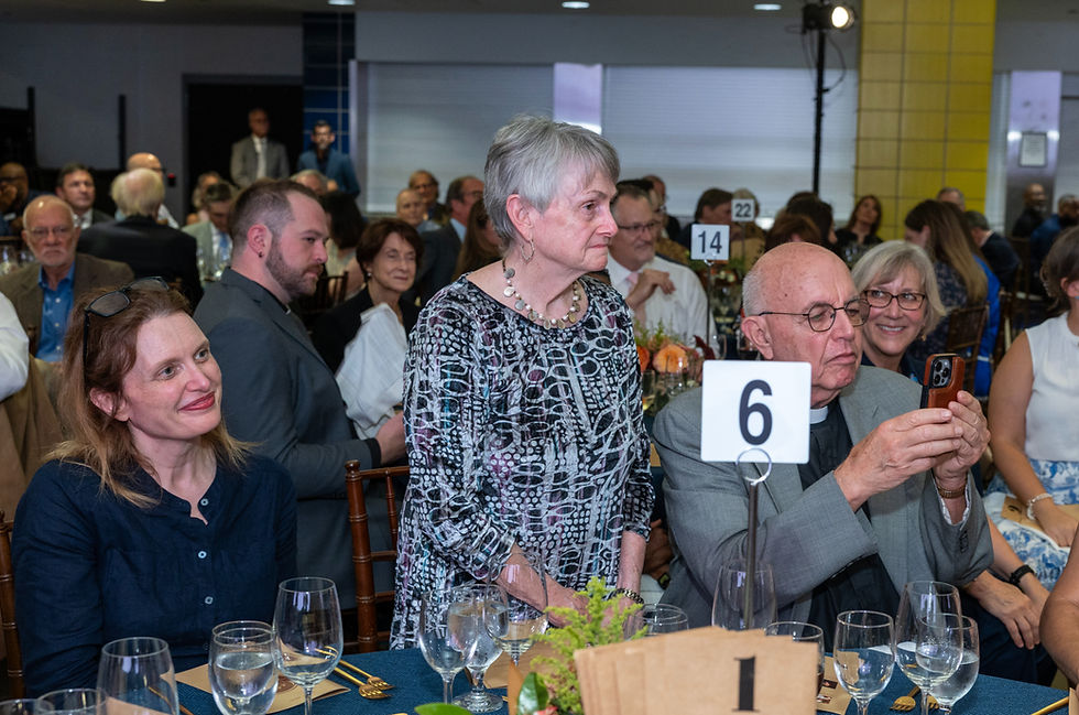 Linda's daughter Carrie, Linda, and her husband Dale as she was recognized at this year's Come to the Table gala.