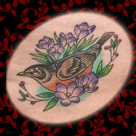 Jen Black Toronto tattoo artist tattooing out of Lewis Family Tattoo Company 2235A Dundas Street West colour tattoo