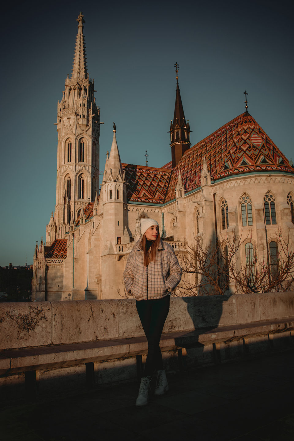 Solo traveler photoshoot at Fisherman’s Bastion during sunrise in Budapest.