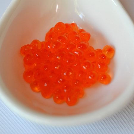 trout roe in a small white serving dish