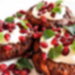 Harissa Sweet Potato Latkes with Spicy Yogurt Sauce, Mint, and Pomegranates