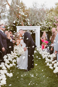 bride and groom heading to their wedding reception