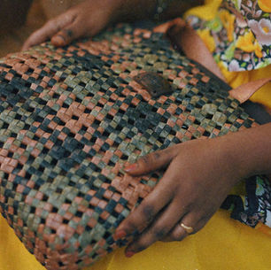 woman with a weaved bag