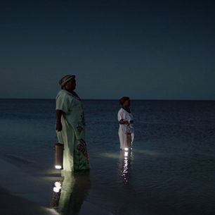 E-Dina Waterlight, women with lamps in the sea