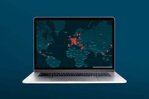 Laptop with a map of the world
