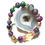 Thumbnail: Two metal bronze skulls with purple and green beads with gold tones