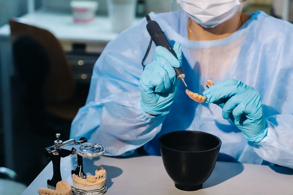 dental-technician-working-on-denture-in-a-lab-2026-03-24-15-23-04-utc.webp