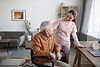 portrait-smiling-female-nurse-helping-senior-man-wheelchair-retirement-home-copy-space.jpg