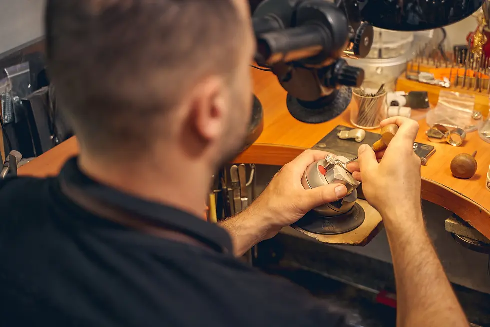 goldsmith-working-on-jewelry-piece-at-desk-2026-01-08-22-13-45-utc.webp