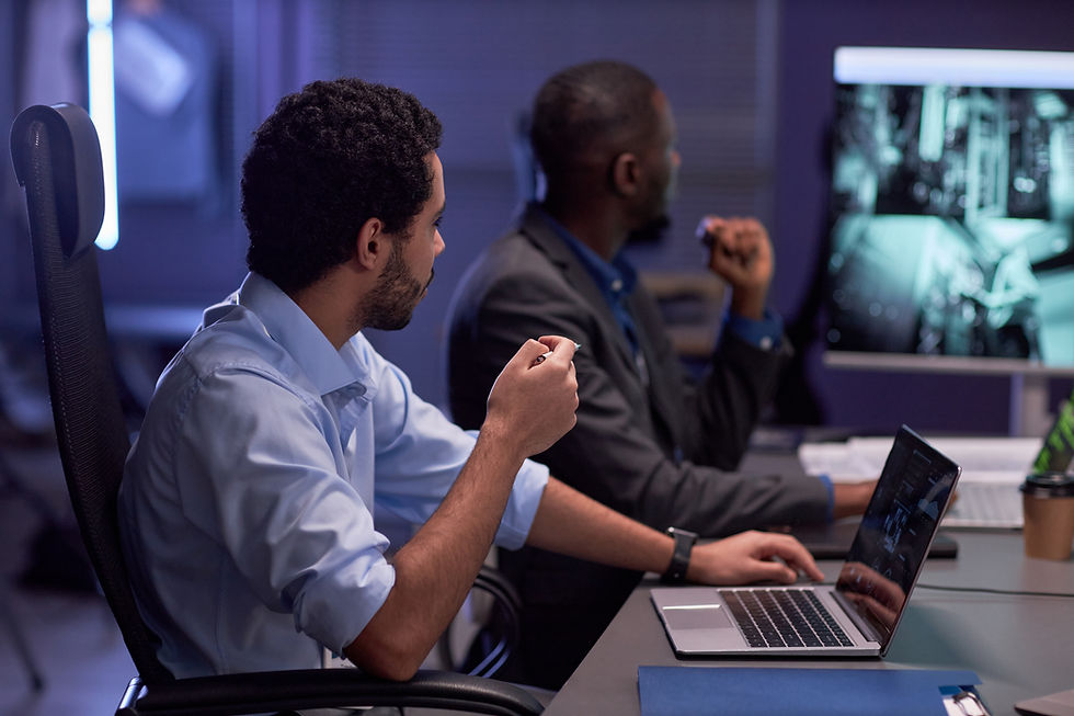 two-men-looking-at-screen-during-meeting-in-it-sec-2026-03-19-10-40-28-utc.jpg