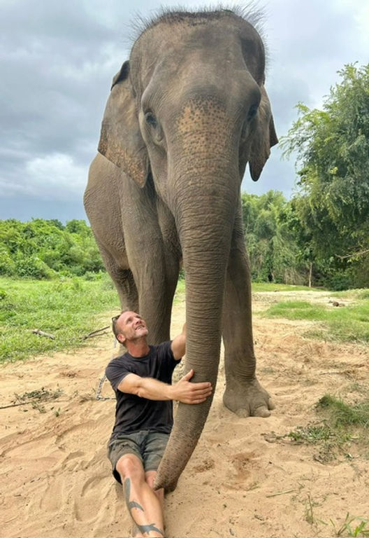 Nook and her buddy, Tom at Elephants' Home & Nature in Kanchanaburi , near Bangkok, Thailand.