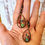 Thumbnail: Artisan Emerald Dolphin Play Earrings