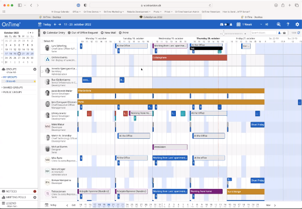 Calendar software interface showing a weekly schedule with various meetings and events. Blue, red, and orange blocks denote events and availability.