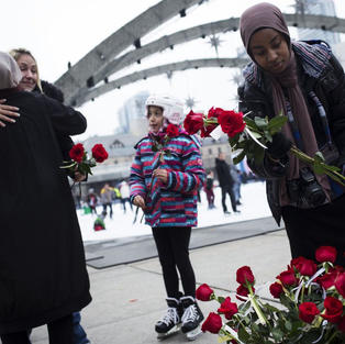 Muslim Women Hand Out Roses as a Thank-You for Toronto’s Support
