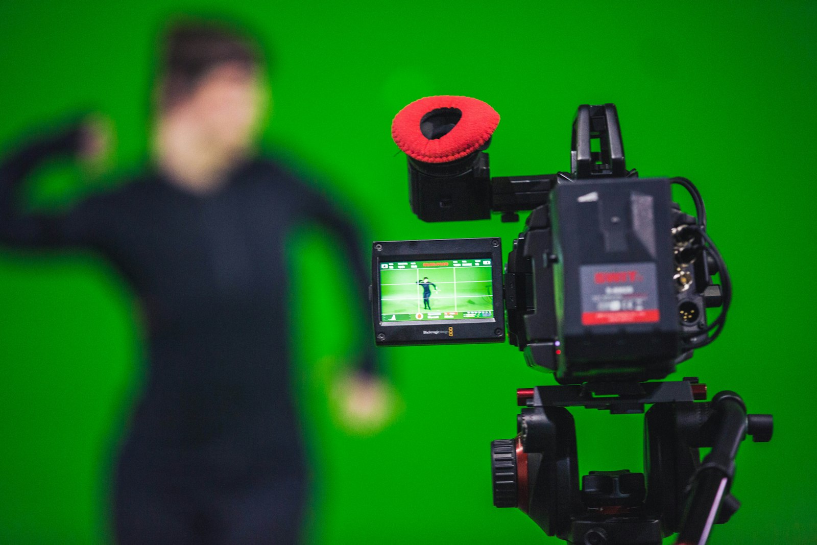 Motion capture performer and camera in a production studio