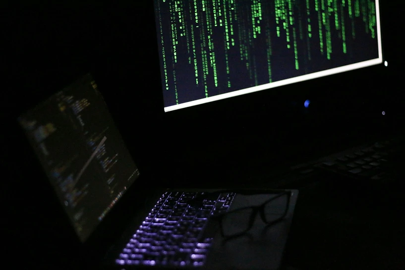 Laptop displaying computer code