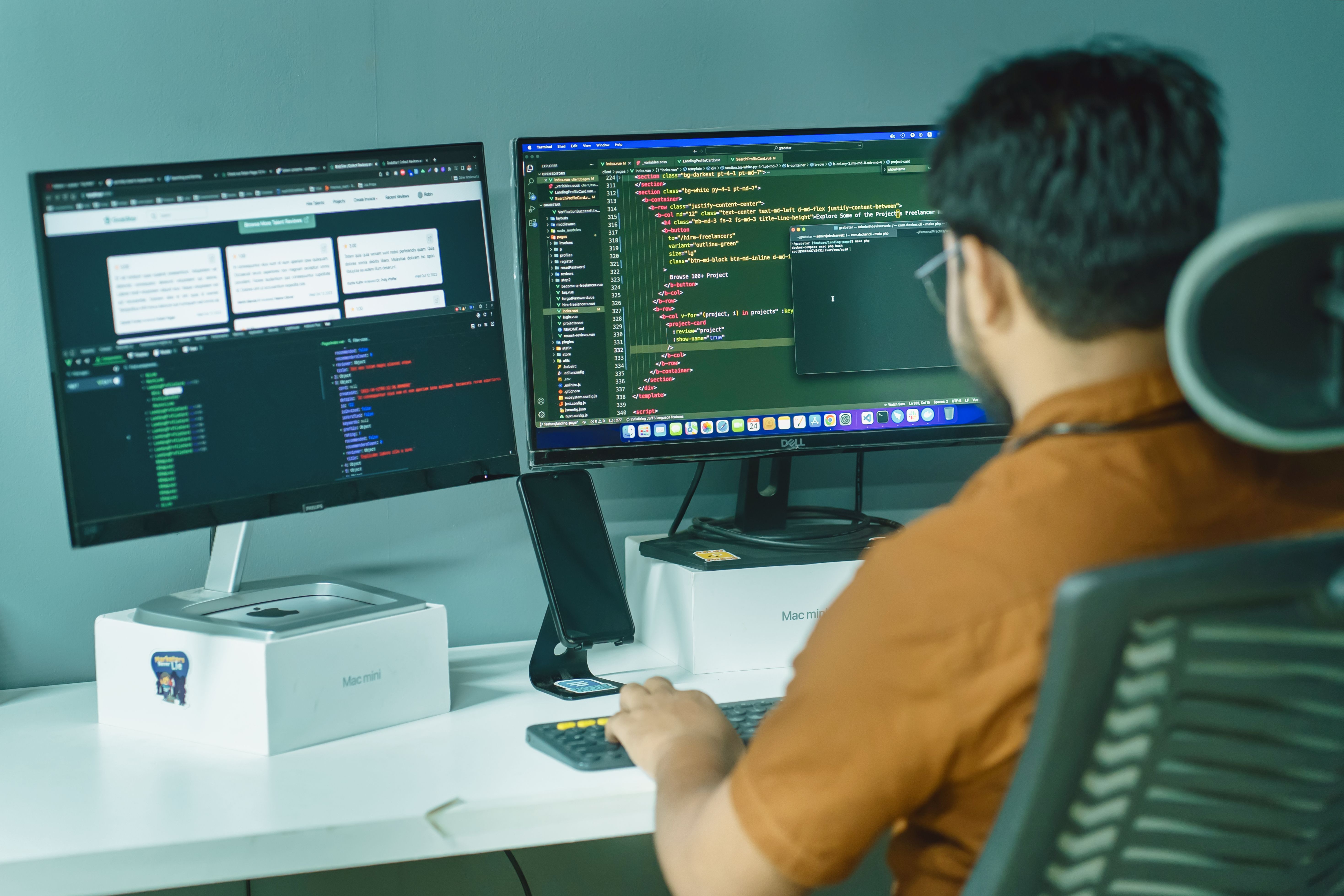 Software developer reviewing game-ready facial animation data on dual monitors