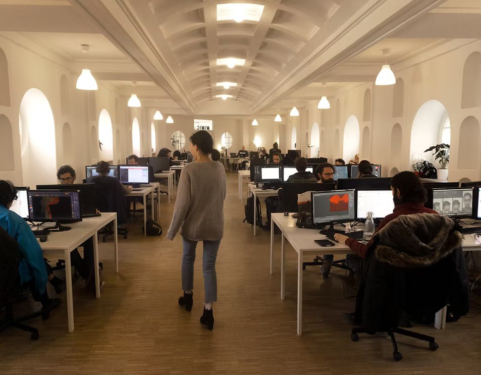 Game production studio team planning 3D art outsourcing costs
