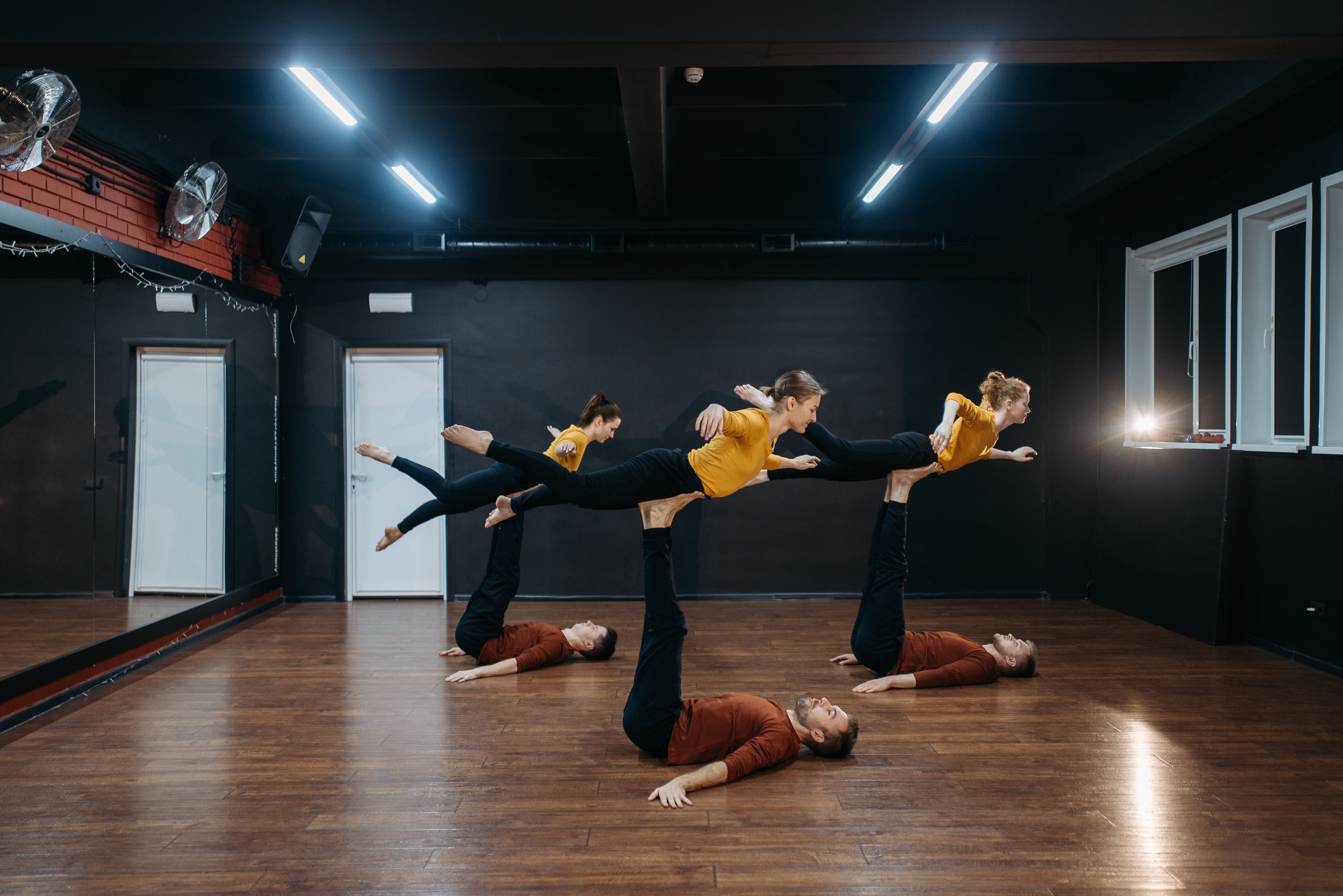 Dancers rehearsing expressive poses that inspire stylized character animation