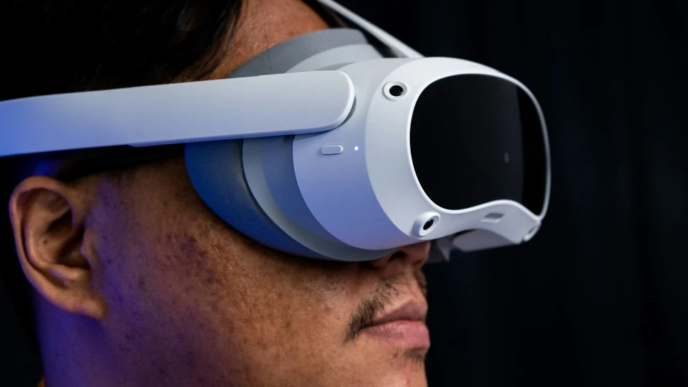 Close-up of a person wearing a Pico virtual reality headset