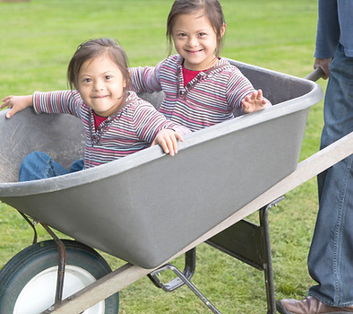 Twins with Down Syndrome in Wheelbarrow
