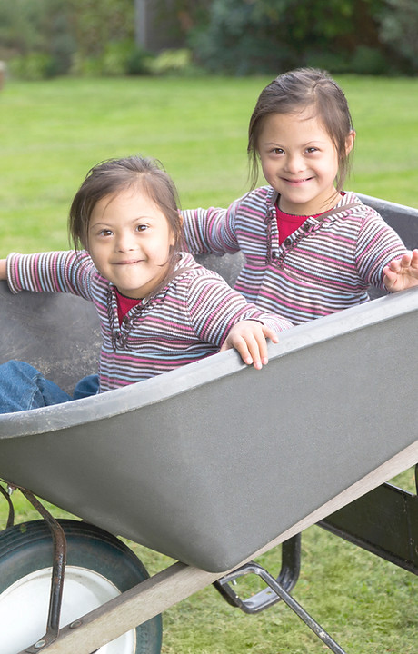 Twins with Down Syndrome in Wheelbarrow