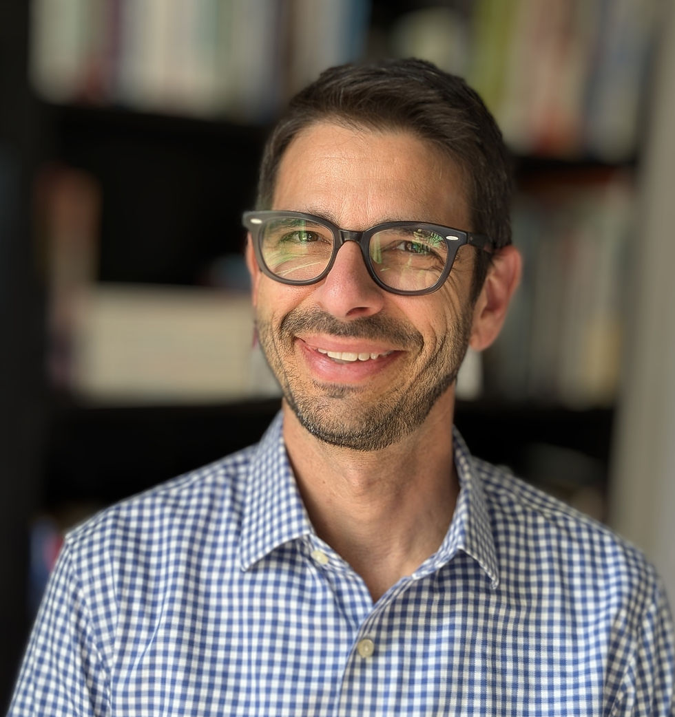 Headshot photo of Matt Plavnick, the founder and principal of Axis Marketing Strategies