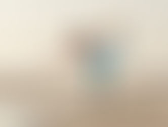 Woman in dancer pose on the beach