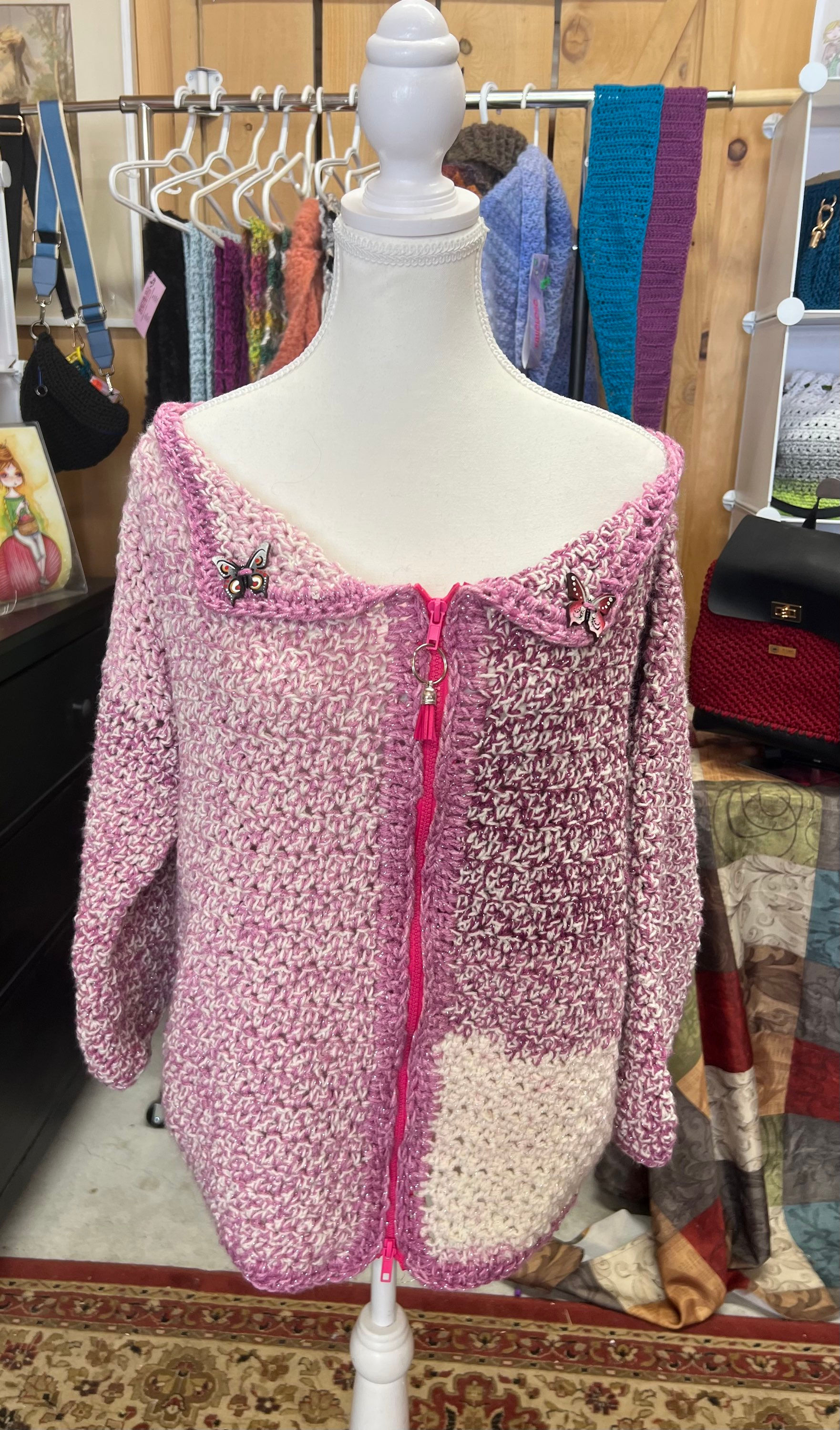 Veste rose papillons 