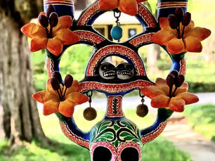 Flowers Blooming In A Skull Vase