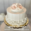 Thumbnail: Dezicakes  Fake Cake White Wedding Cake with Peach Roses
