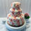 Thumbnail: Dezicakes Peach & Ivory Fake Wedding Cake Three Tier