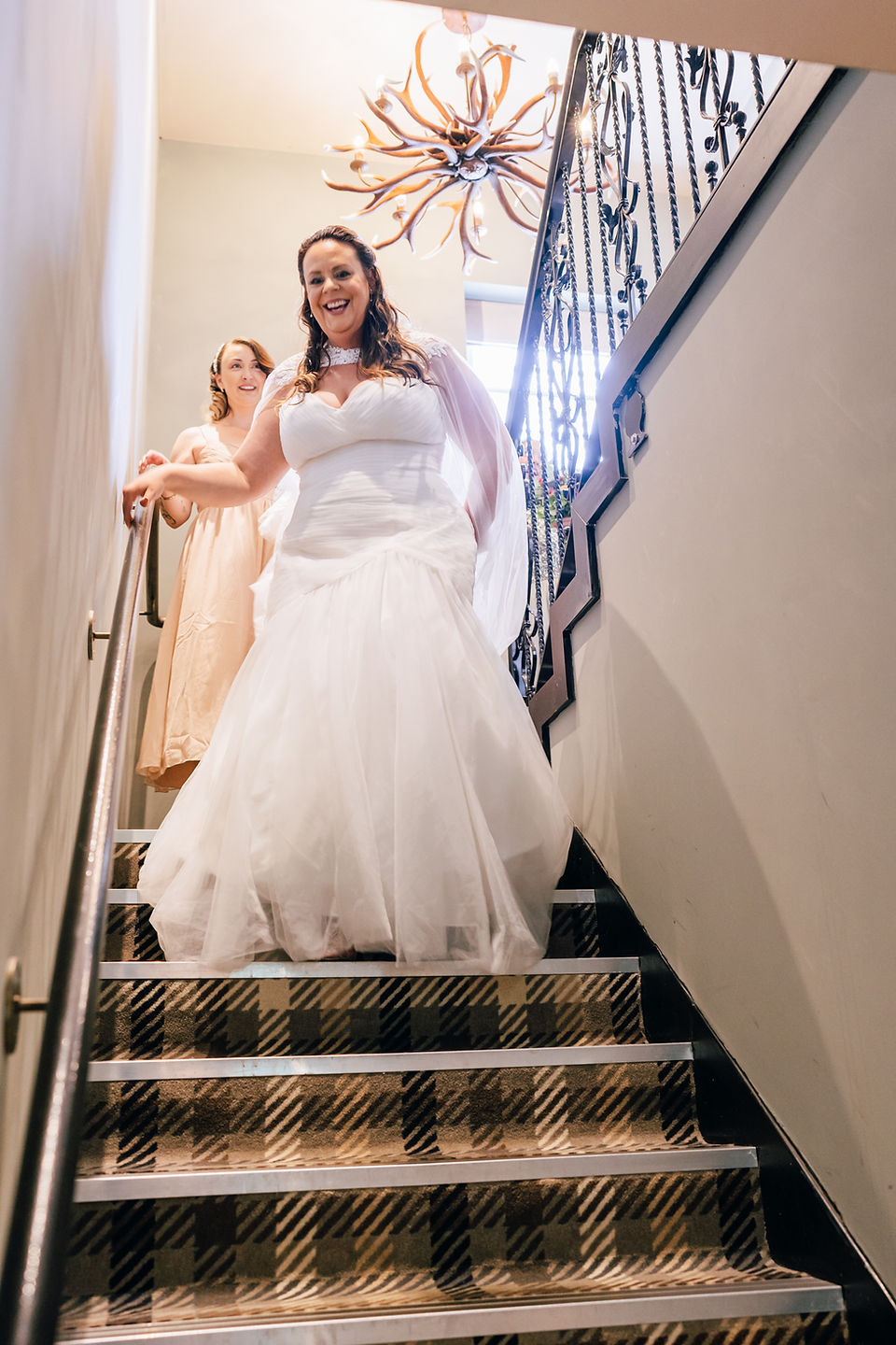 A bride descending the stairs