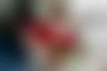 Bouquet with deep red and white flowers taken from above