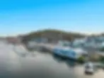Dronebilde Huvik Brygge ved sjøen i Sandefjord