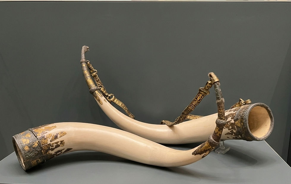 Reconstructed drinking horns with original silver mounts