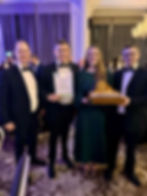Winning team collecting award at ICE Yorkshire & Humber