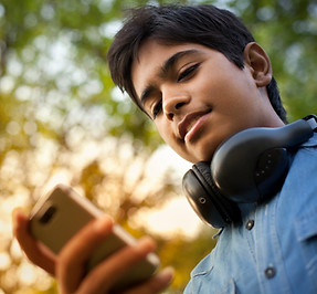 Boy Checking his Phone