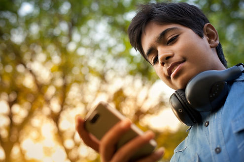 Boy Checking his Phone