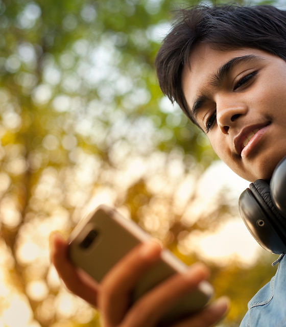 Boy Checking his Phone