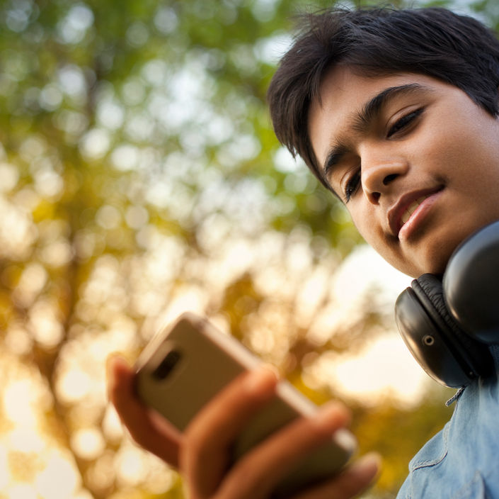 Boy Checking his Phone