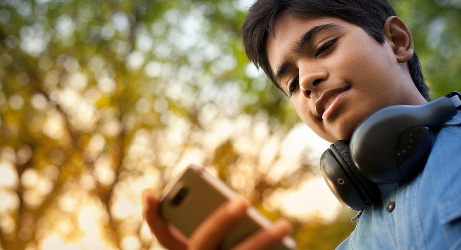 Boy Checking his Phone