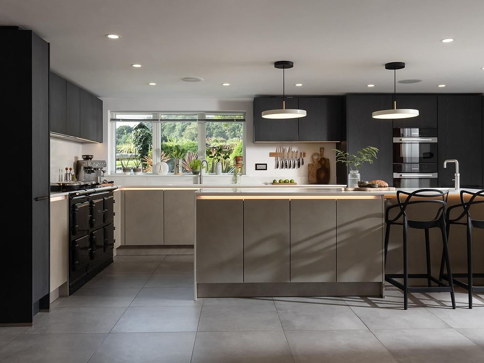 wide contemporary kitchen with aga and full cabinetry wall – kitchen – LA Associates Falmo